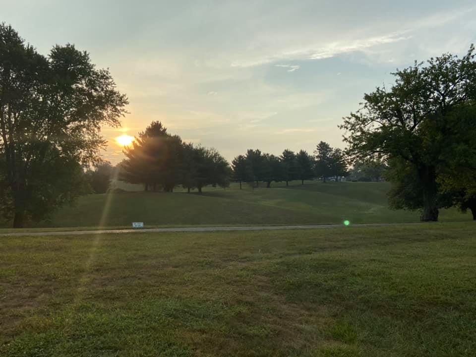 view down the fairway at sunset
